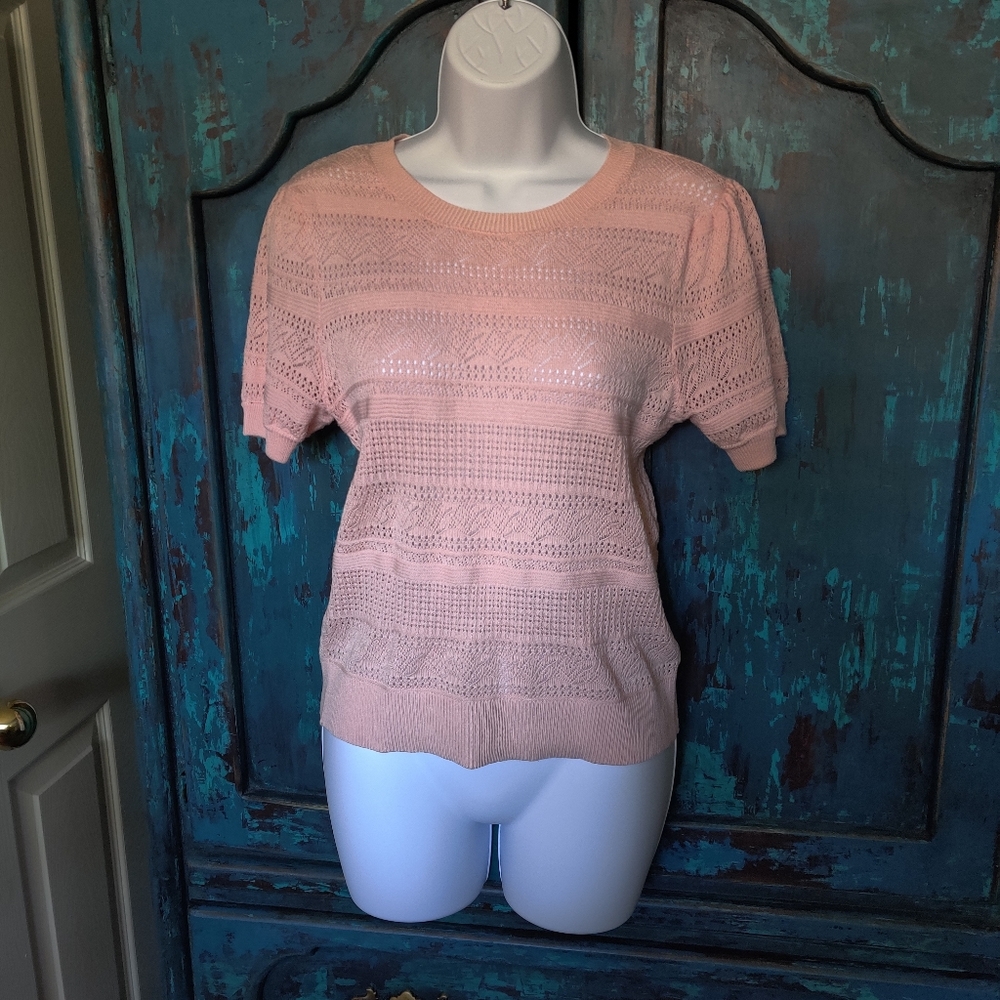Light pink knit blouse